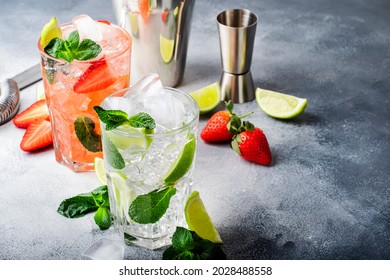 Mojito Mocktail Set With Lime, Mint, Strawberry And Ice In Glass On Gray Background