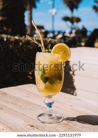 Similar – Image, Stock Photo Mojito, traditional Cuban cocktail made with white rum, sugar, lime juice, sparkling water, and mint leaves.