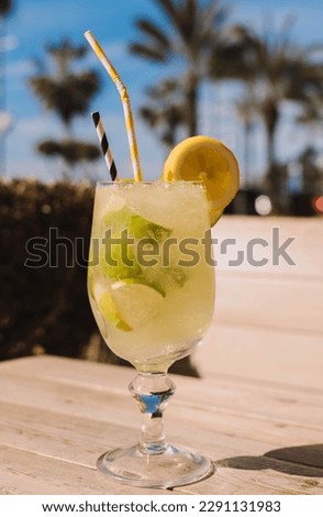 Similar – Image, Stock Photo Mojito, traditional Cuban cocktail made with white rum, sugar, lime juice, sparkling water, and mint leaves.