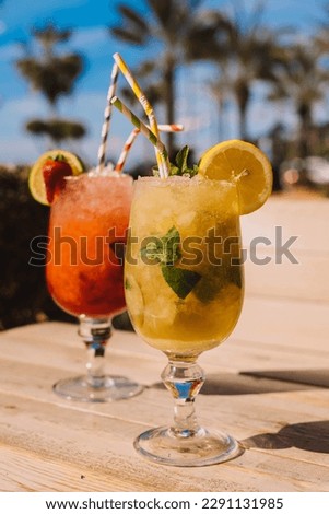 Similar – Image, Stock Photo Mojito, traditional Cuban cocktail made with white rum, sugar, lime juice, sparkling water, and mint leaves.