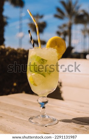 Similar – Image, Stock Photo Mojito, traditional Cuban cocktail made with white rum, sugar, lime juice, sparkling water, and mint leaves.