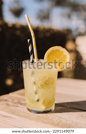 Similar – Image, Stock Photo Mojito, traditional Cuban cocktail made with white rum, sugar, lime juice, sparkling water, and mint leaves.