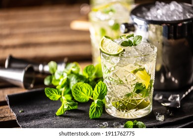 Mojito Or Virgin Mojito Long Rum Drink With Fresh Mint, Lime Juice, Cane Sugar And Soda.