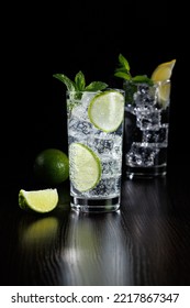 Mojito Or Virgin Mojito Long Rum Drink With Fresh Mint, Lime Juice, Cane Sugar And Soda. Black Background.