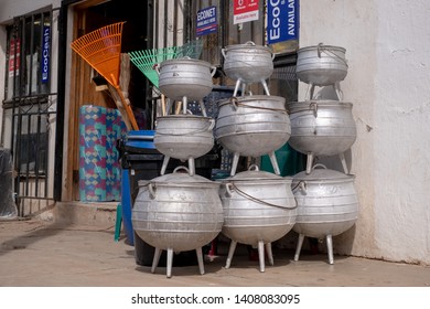 Mokhotlong, Lesotho. March 2019. Shop On The Main Street In Mokhotlong, Lesotho, Africa, Selling Metal Cauldrons For Food.