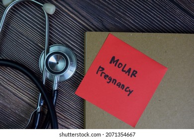 Molar Pregnancy Write On Sticky Notes Isolated On Wooden Table.