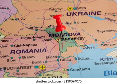Moldova, selective focus on Kishinev- capital city, pinned on political map. - Shutterstock ID 2139094075