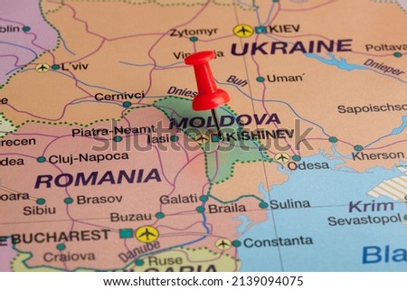 Moldova, selective focus on Kishinev- capital city, pinned on political map.