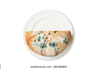 Moldy bread expired on ceramic dish isolated on white background, mold on food, idea of poison and affected food from  long time storage