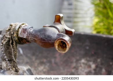 Moldy And Old Outdoor Faucet
