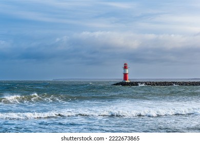 Mole on shore of the Baltic Sea during the storm Eunice in Warnemuende, Germany. - Powered by Shutterstock