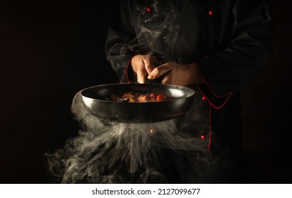 Molecular gastronomy or cuisine. Chef cooking vegetables in a frying pan. Menu for restaurant or hotel with advertising space. - Shutterstock ID 2127099677