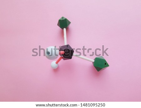 Molecular structure model of Dichloromethane molecule. Dichloromethane (DCM or methylene chloride) is an organic compound with the formula CH2Cl2. Black=C, green=Cl, white=H. 