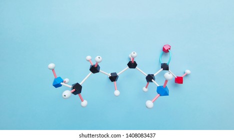 Molecular structure model of essential amino acid L-lysine required for growth and tissue repair. Lysine (L- lysine, Lys, K) amino acid molecule is used in the biosynthesis of proteins.