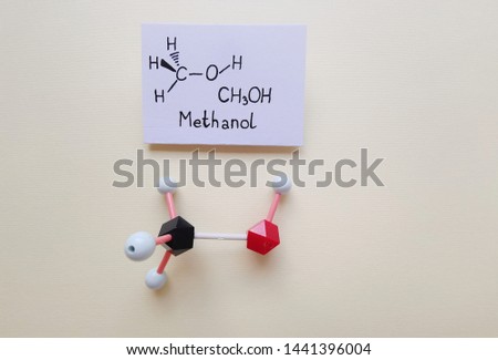 Molecular structure model and structural chemical formula of methanol molecule. CH3OH, ball-and-stick model and skeletal formula. Black=C, red=O, white=H.