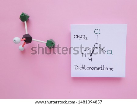 Molecular structure model and structural chemical formula of Dichloromethane molecule. Dichloromethane (DCM or methylene chloride) is an organic compound with the formula CH2Cl2.