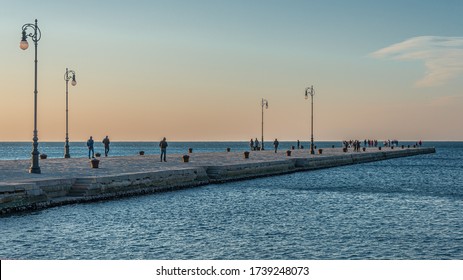 The Molo Audace pier of Trieste in a winter evening - Shutterstock ID 1739248073