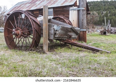 Molson, WA - USA: 05-10-2022: Old Wood Wagon With Rusty Wheels