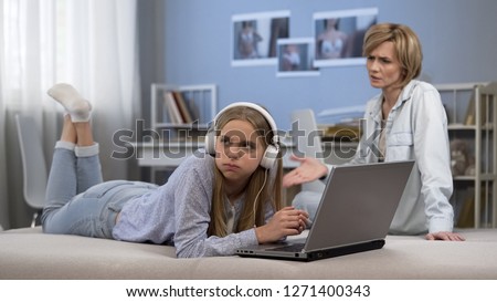 Mom arguing with daughter, spending too much time in internet, misunderstanding