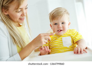 Mom Baby Brushing Teeth