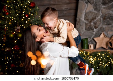 Mom And Baby Are Celebrating New Year At Home.