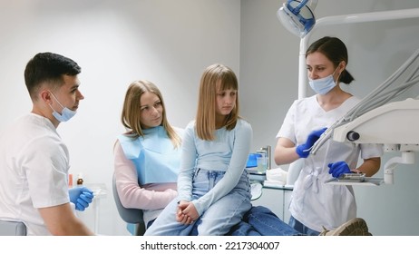 Mom And Baby At The Dentist. Painless Dental Treatment In A Modern Clinic. Positive Family