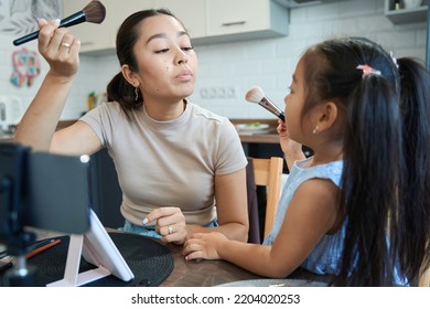 Mom Blogger With Little Daughter Shoot A Vlog About Make-up