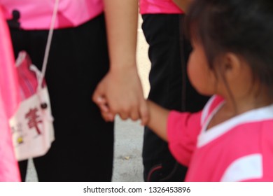 Mom Caught Her Daughter's Hand During A Sporting Event, Filmed As A Blur