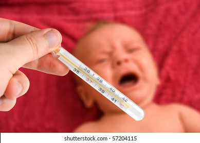 Mom Check The Temperature Of Ill Baby