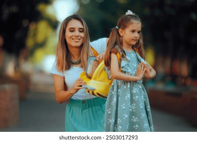 
Mom Checking the Lunch Box is in the School Bag. Adorable kid receiving a sandwich for the kindergarten meal break 
 - Powered by Shutterstock