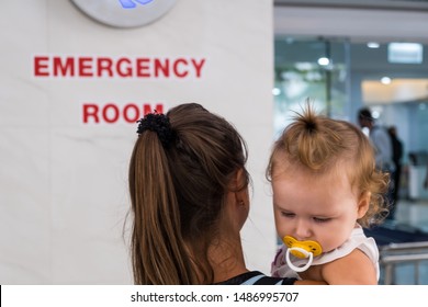 Mom And Child Come In In The Emergency Room At The Hospital In Pattaya Thailand