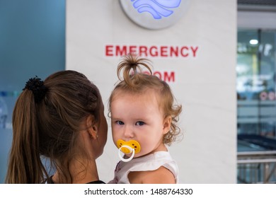 Mom And Child Come In In The Emergency Room At The Hospital In Pattaya Thailand