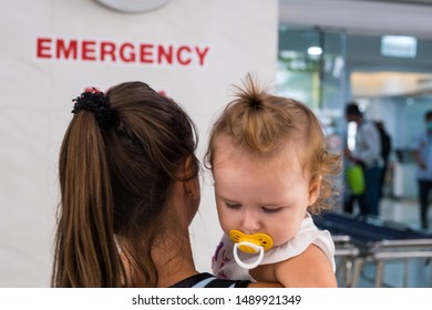 Mom And Child Come In In The Emergency Room At The Hospital In Pattaya Thailand