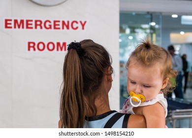 Mom And Child Come In In The Emergency Room At The Hospital In Pattaya Thailand