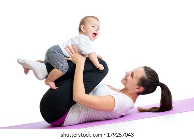 mom with child do gymnastic and fitness exercises