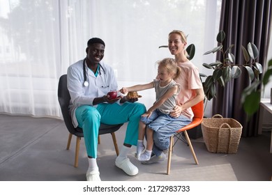 Mom And Child At A Doctor's Appointment With A Nutritionist