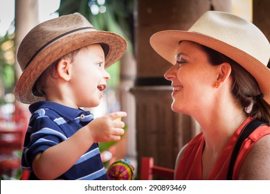 Mom And Child Playing And Singing.