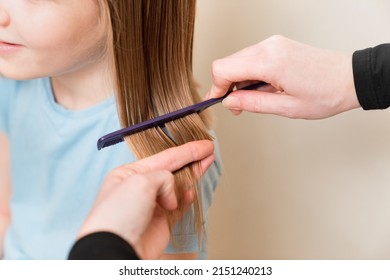 Mom Combs Her Daughter's Wet Hair Before Cutting. Cutting Hair At Home. Life Hacks And Rules Of Hair Care. Special Combs And Scissors For Hairdressers.