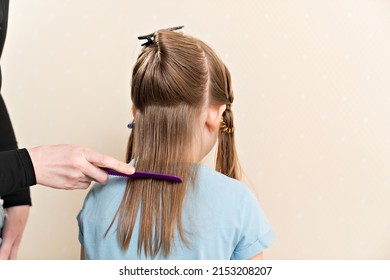 Mom Combs Her Daughter's Wet Hair Before Cutting. Cutting Hair At Home. Life Hacks And Rules Of Hair Care. Special Combs And Scissors For Hairdressers.