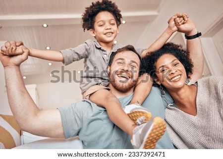 Mom, dad and boy on shoulders, piggyback and portrait in home with smile, holding hands and solidarity. Interracial family house, mother and father with son, playing plane games and bonding with love