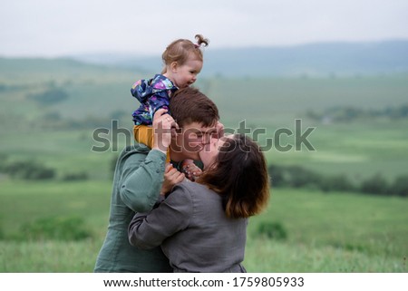 Similar – Family totem play outfoor happy in spring