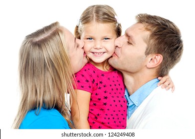 Mom And Dad Kissing Their Beautiful Kid On Cheeks From Both The Sides