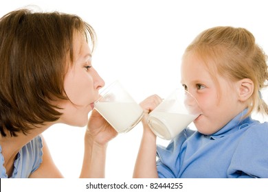 Mom And Daughter Drink Milk.