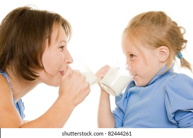 Mom And Daughter Drink Milk.