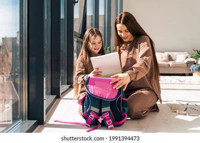 Mom And Daughter Prepare School Backpack