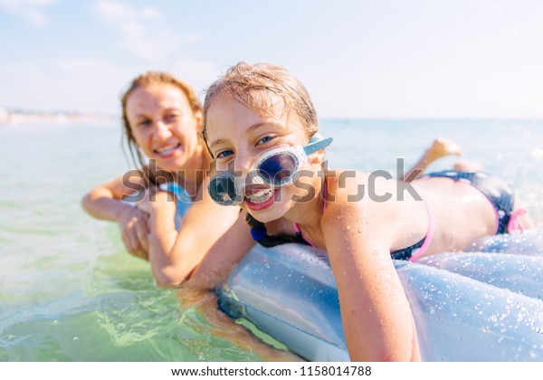 mommy daughter swim