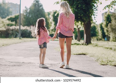 mom and daughter walk in the Park shirts