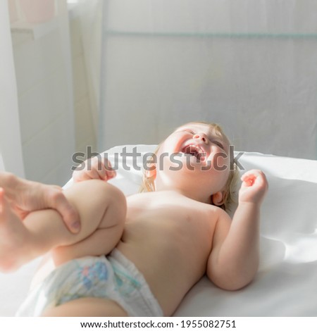 Similar – Baby asleep while parents caress