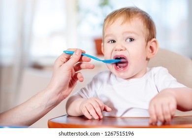 Mom Feeding Baby Holding Out Her Stock Photo (Edit Now) 1267515196