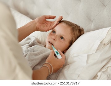 Mom, hand or thermometer for sick child in home with monitor temperature for fever or covid infection. Parent, daughter or checking for cold, illness or flu in bedroom for forehead or mpox symptoms - Powered by Shutterstock